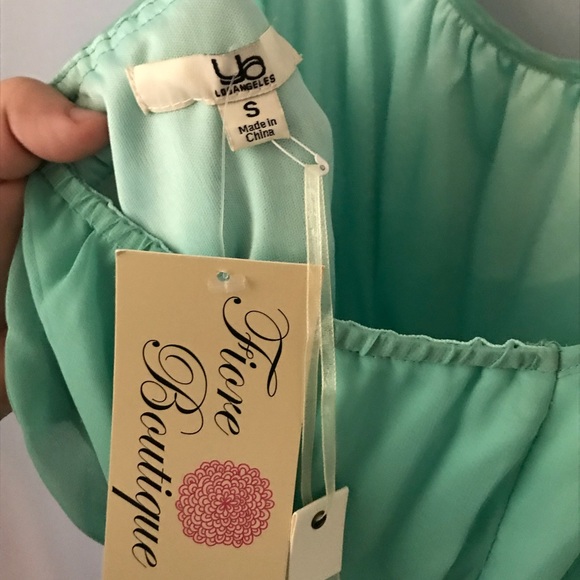 Mint green bow racer back mini dress. - Picture 4 of 4